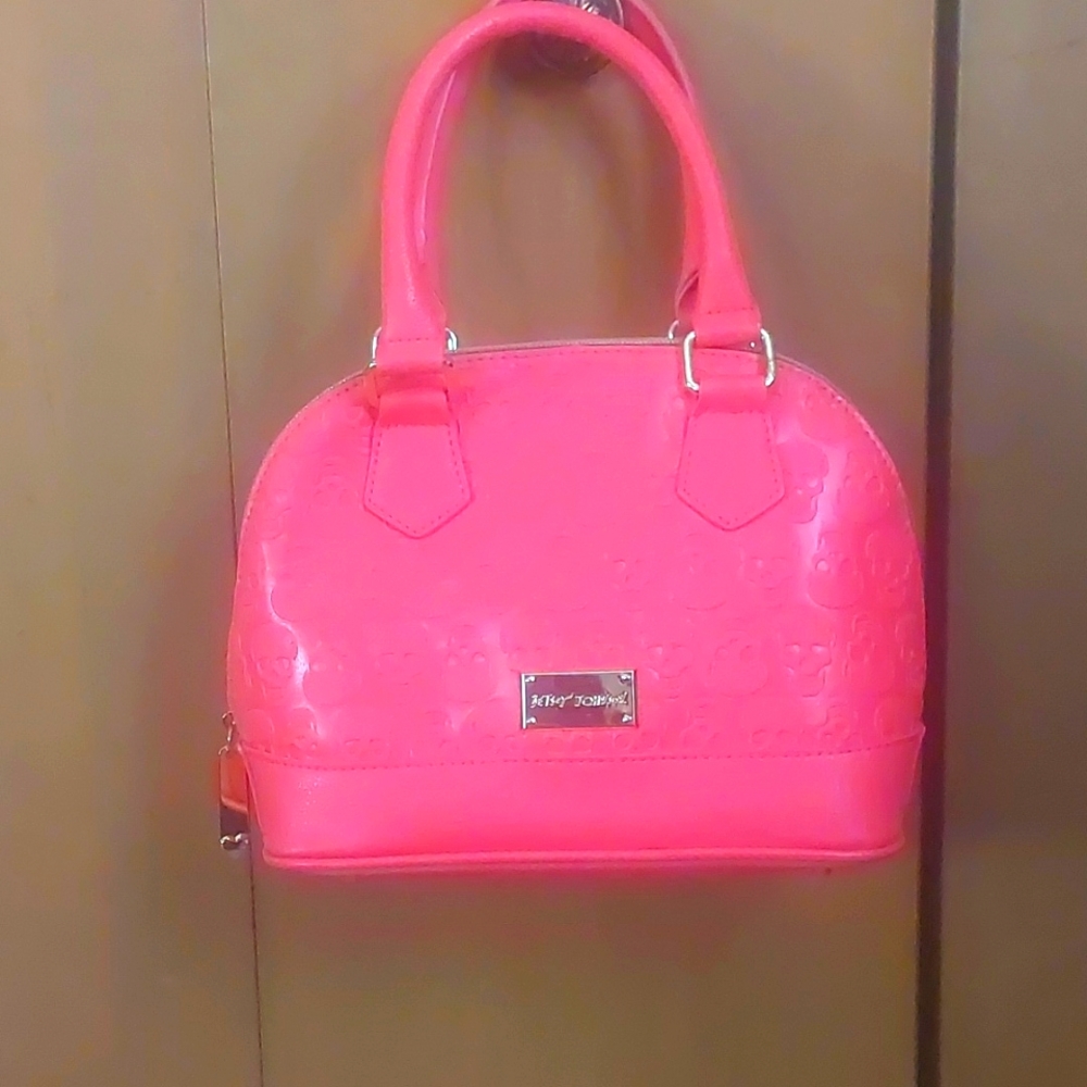 Betsey Johnson crossbody satchel in coral.